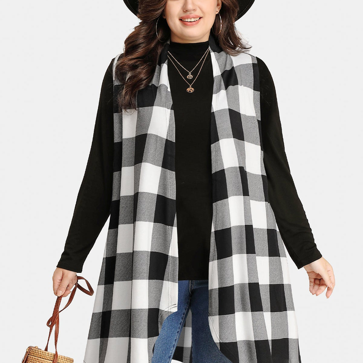 Langer ärmelloser Mantel mit Karomuster und Streifen