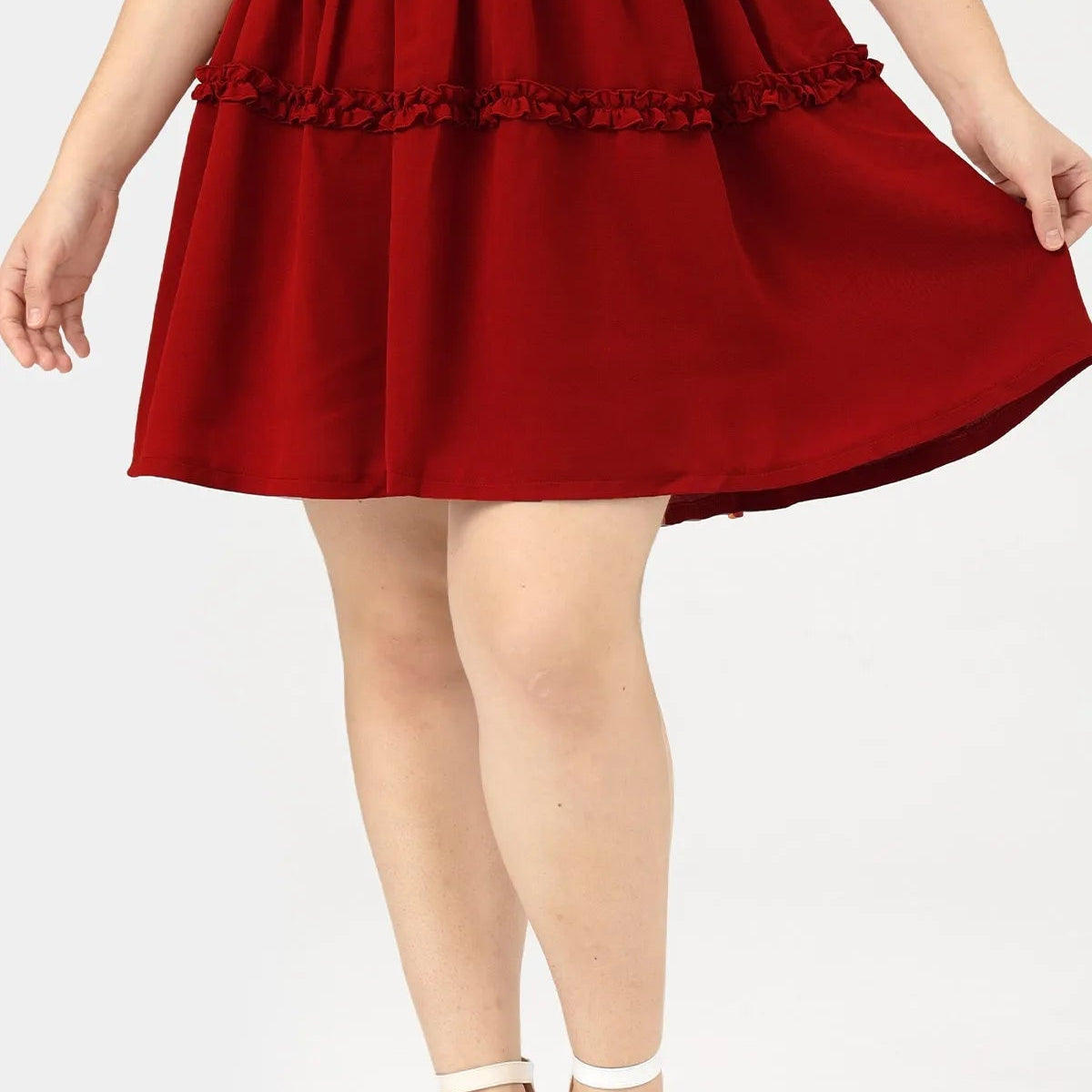 Mini-jupe unie à volants et taille élastique