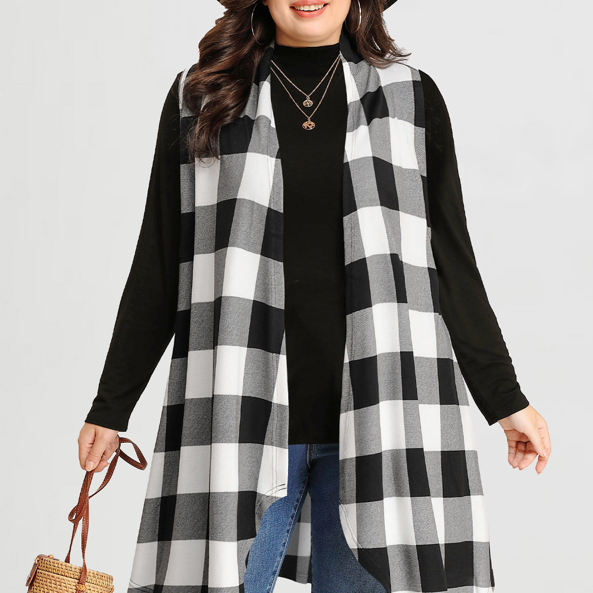 Manteau long sans manches à rayures et carreaux