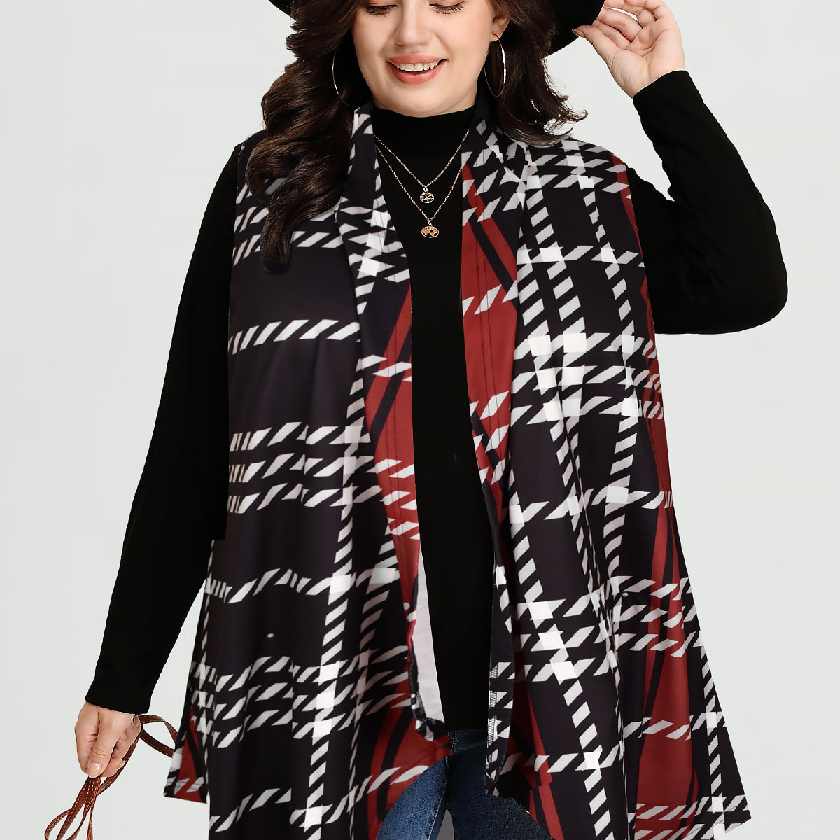 Langer ärmelloser Mantel mit Karomuster und Streifen