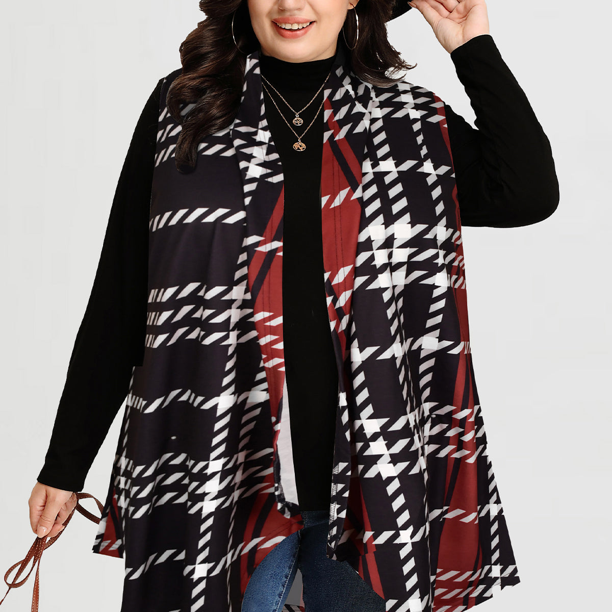 Langer ärmelloser Mantel mit Karomuster und Streifen