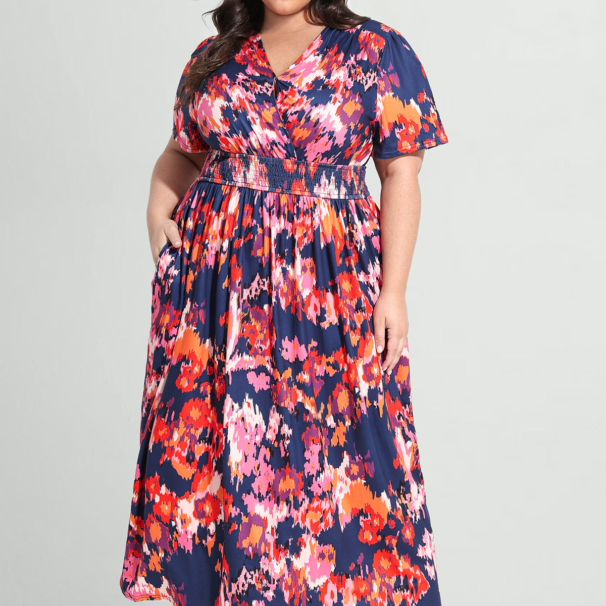 Robe longue trapèze fleurie rose à poches et taille élastiquée Ritera