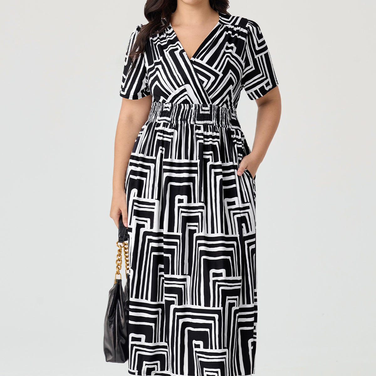 Robe longue trapèze fleurie à taille élastique et poches Ritera